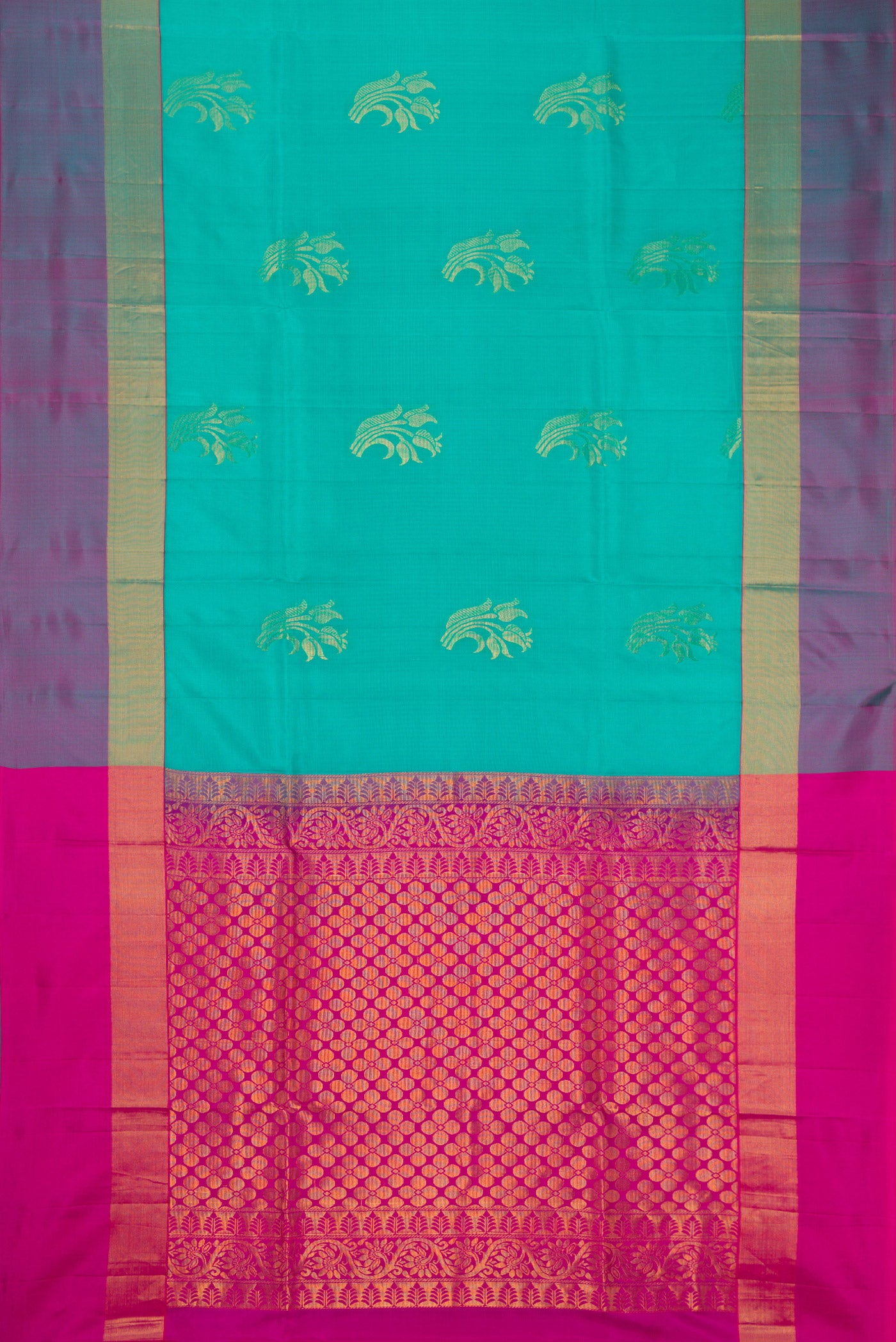 Sea Green Soft Silk Saree with Zari Butta on the body and Fancy Border.  displayed on a mannequin