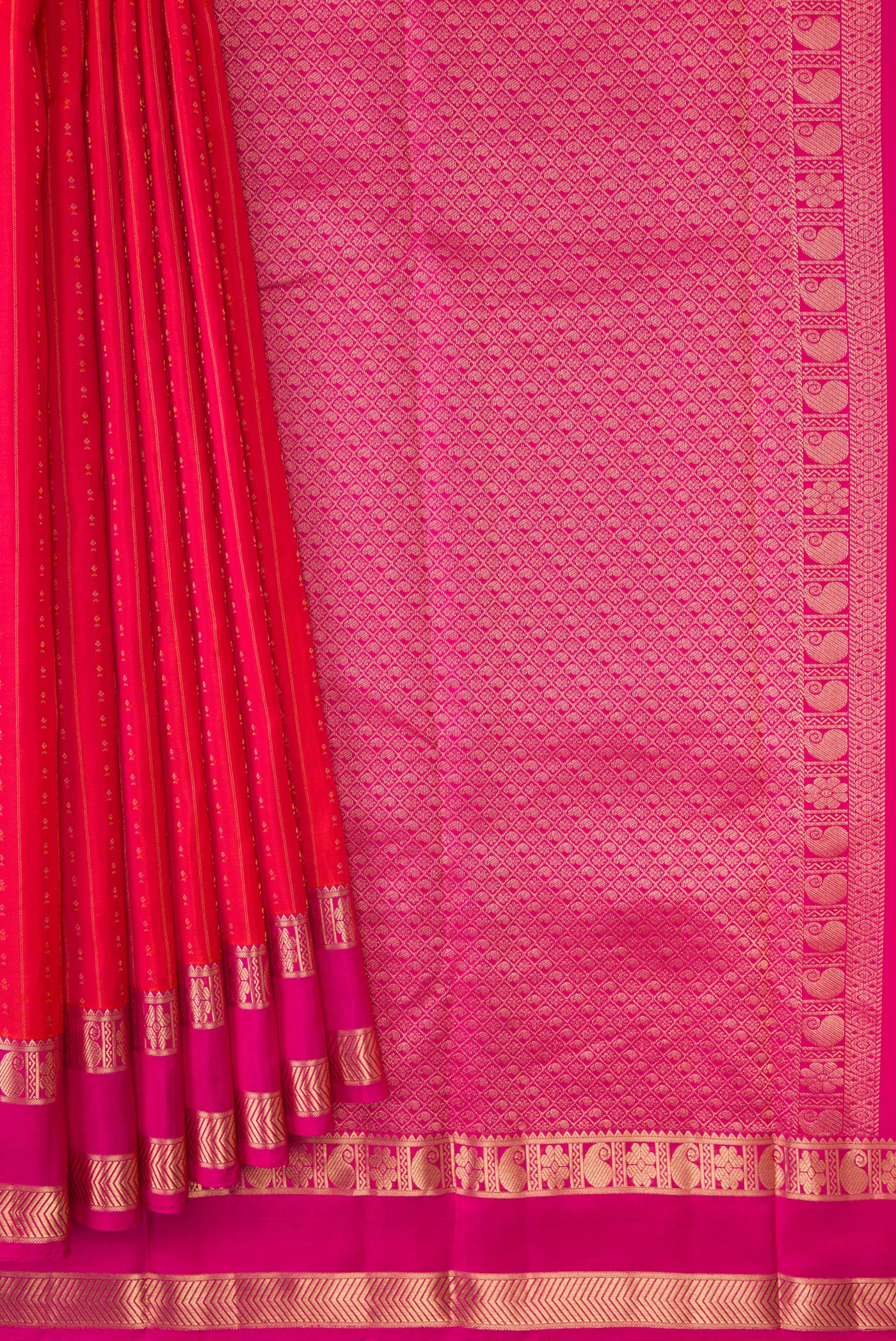 Pleats and pallu of Orange Dual Tone Kanchipuram Silk Saree with Zari Butta on the body and Zari Border. 
