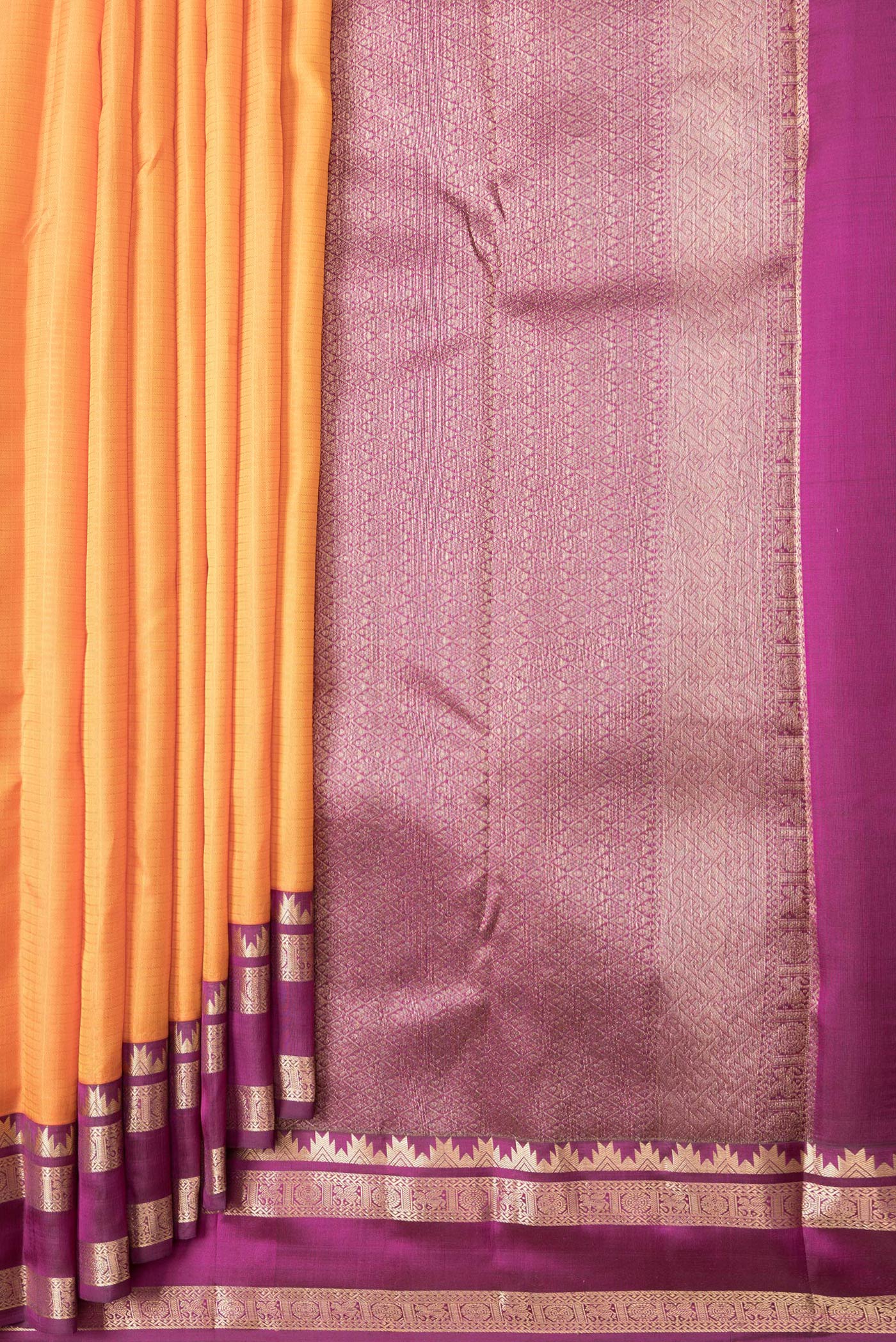 Pleats and pallu of Orange Dual Tone Kanchipuram Silk Saree with Checked design on the body and Zari Border. 