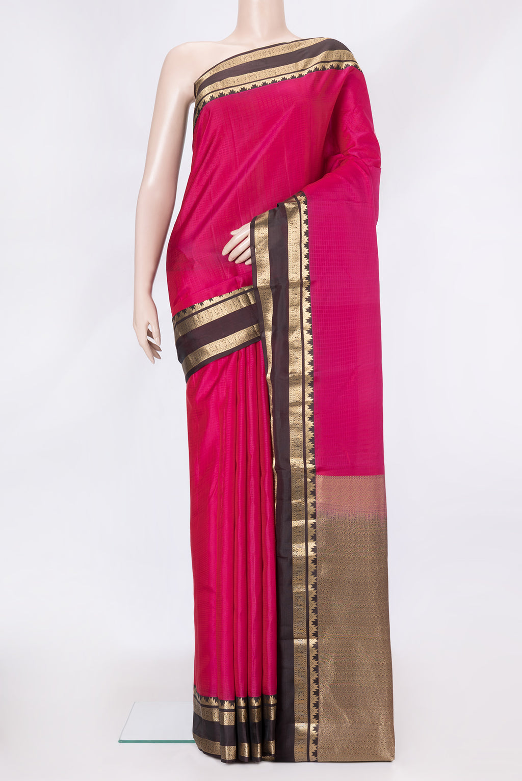 Pink Dual Tone Kanchipuram Silk Saree with Checked design on the body and Zari Border.  displayed on a mannequin