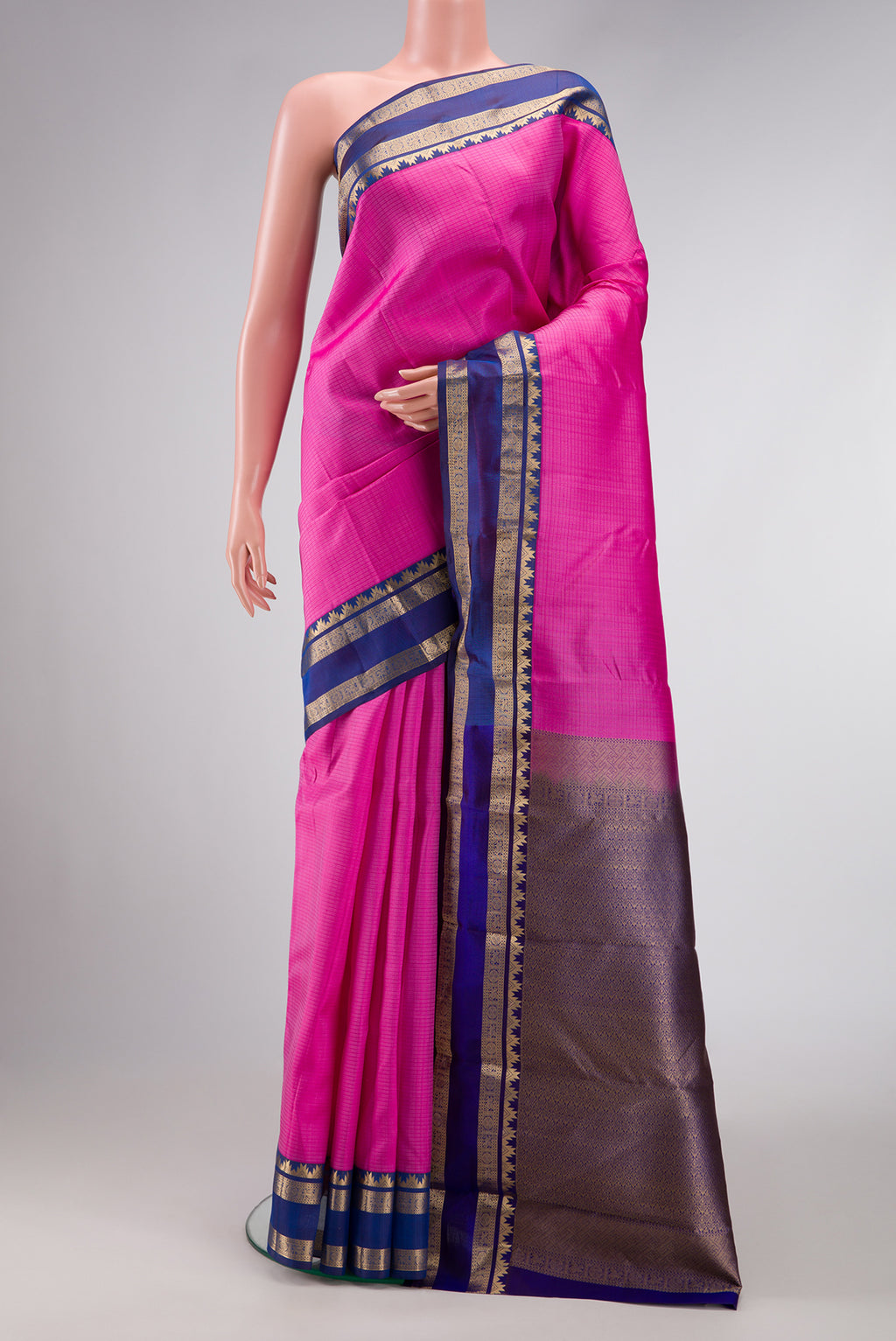 Pink Dual Tone Kanchipuram Silk Saree with Zari Butta on the body and Zari Border.  displayed on a mannequin