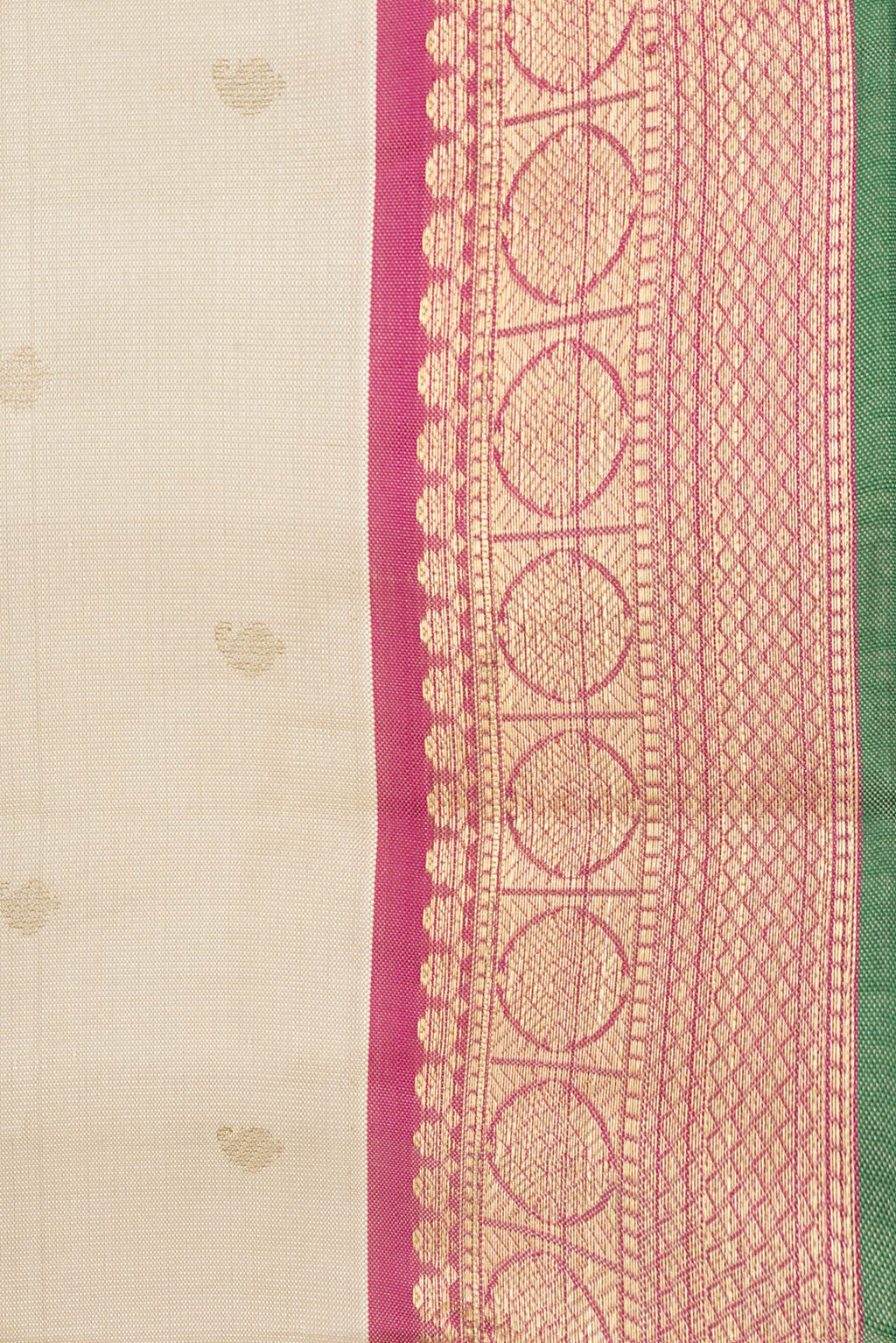 Border image of Beige Dual Tone Kanchipuram Silk Saree with Zari Butta on the body and Zari Border. 
