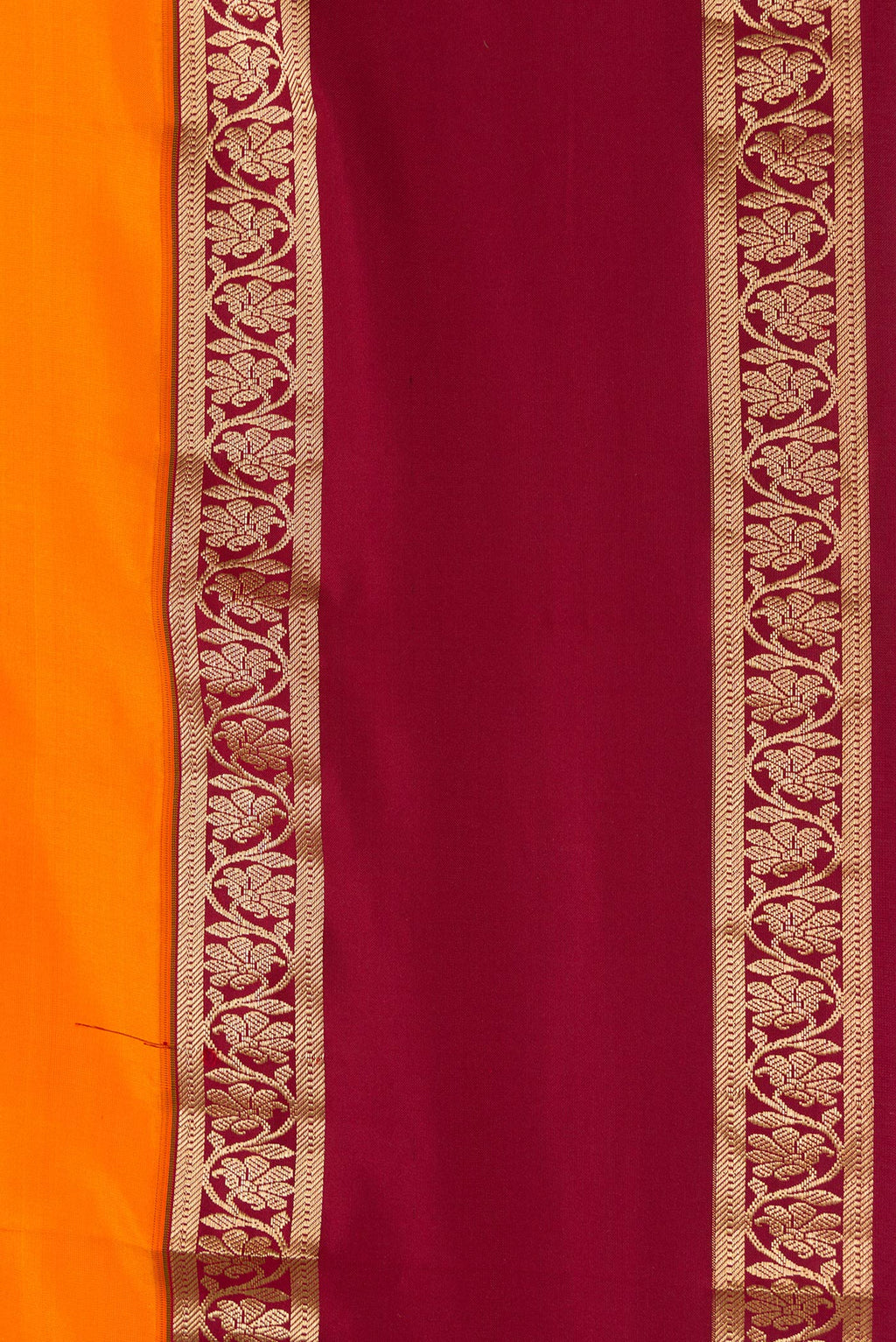 Border image of Orange Dual Tone Kanchipuram Silk Saree with Plain Body and Zari Border. 