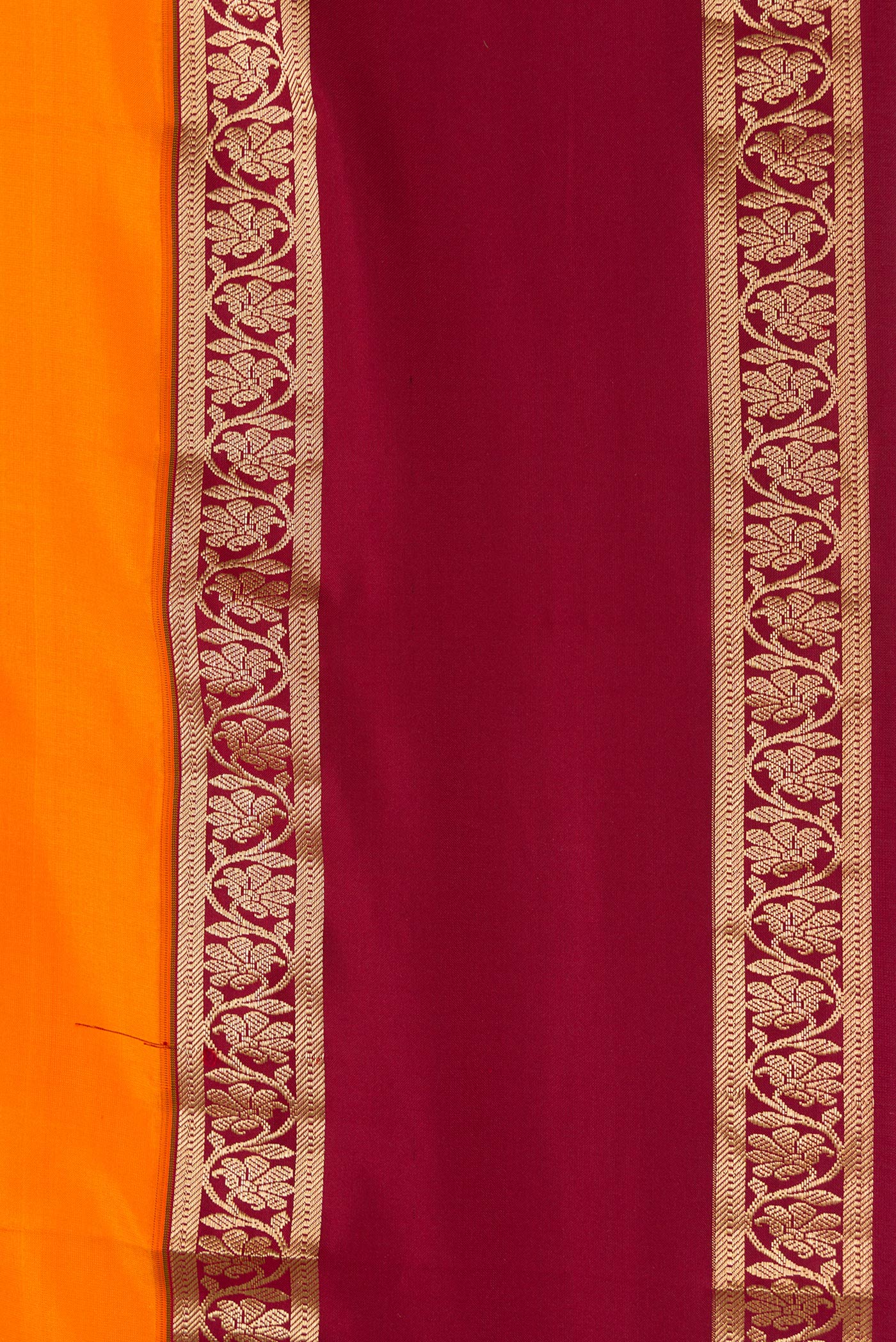 Border image of Orange Dual Tone Kanchipuram Silk Saree with Plain Body and Zari Border. 