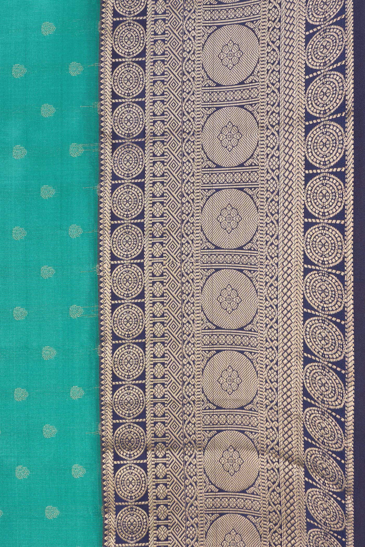 Border image of Sea Green Dual Tone Kanchipuram Silk Saree with Zari Butta on the body and Zari Border. 
