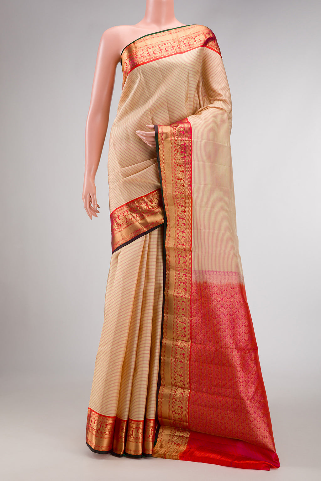 Sandal Dual Tone Kanchipuram Silk Saree with Stripes on the body and Zari Border.  displayed on a mannequin