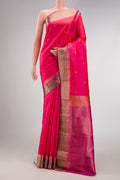 Pink Dual Tone Kanchipuram Silk Saree with Zari Butta on the body and Zari Border.  displayed on a mannequin
