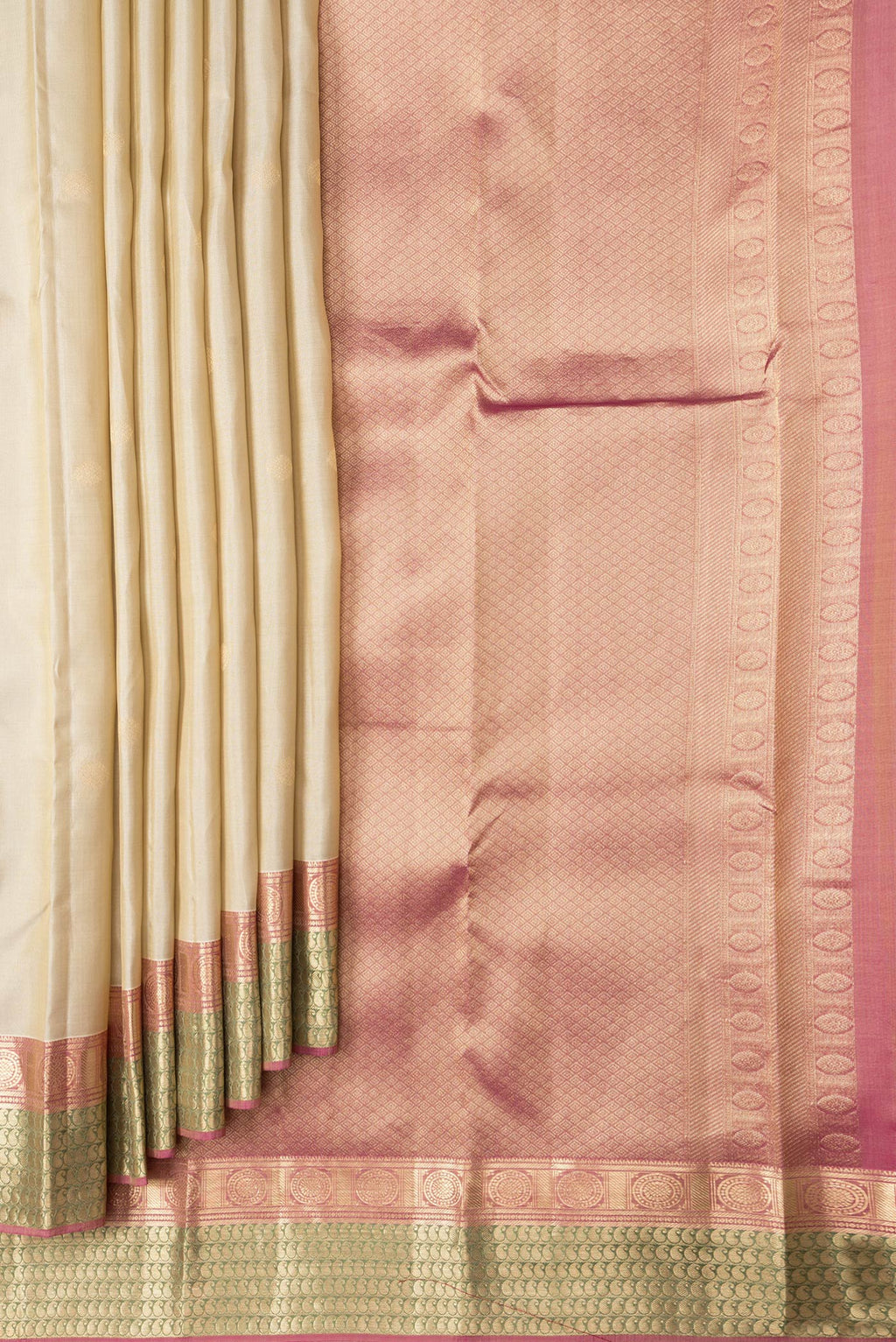 Pleats and pallu of Dark Beige Dual Tone Kanchipuram Silk Saree with Zari Butta on the body and Zari Border. 