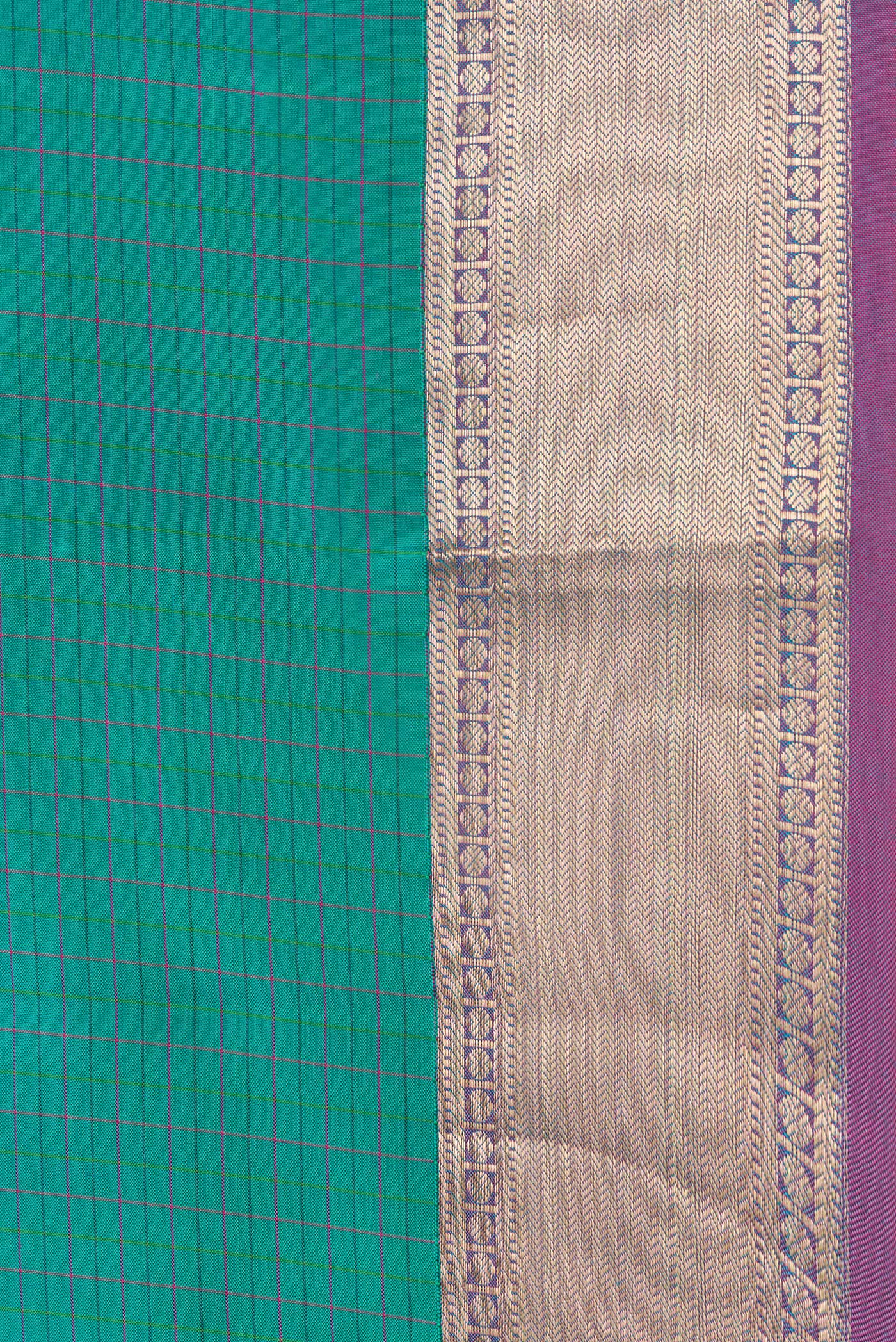 Border image of Green Dual Tone Kanchipuram Silk Saree with Checked design on the body and Zari Border. 