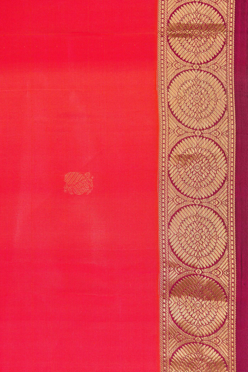 Border image of Coral Dual Tone Kanjivaram Silk Saree with Zari Butta on the body and Thin Zari Line. 