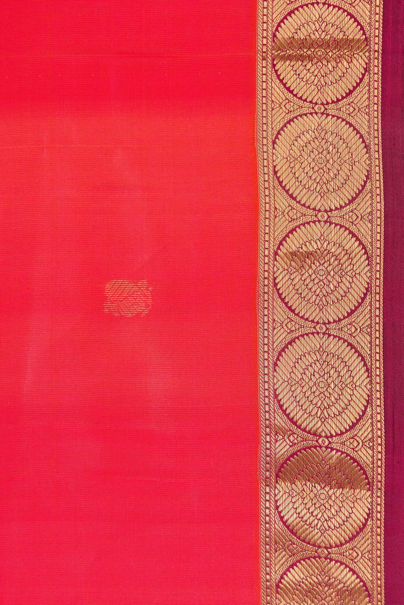 Border image of Coral Dual Tone Kanjivaram Silk Saree with Zari Butta on the body and Thin Zari Line. 