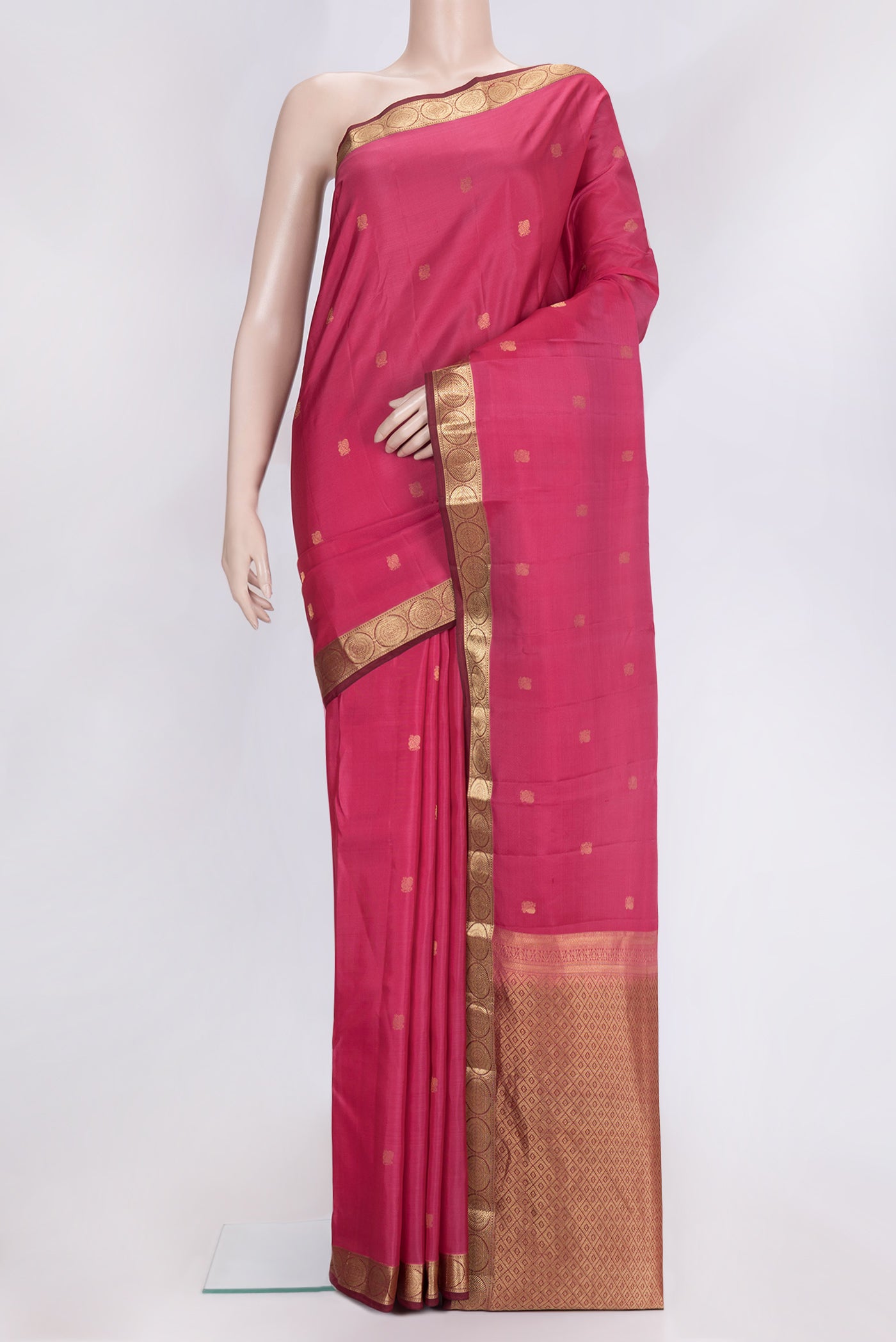 Pink Dual Tone Kanjivaram Silk Saree with Zari Butta on the body and Zari Border.  displayed on a mannequin