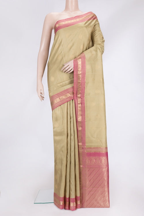 Dark Beige Dual Tone Kanchipuram Silk Saree with Zari Butta on the body and Zari Border.  displayed on a mannequin