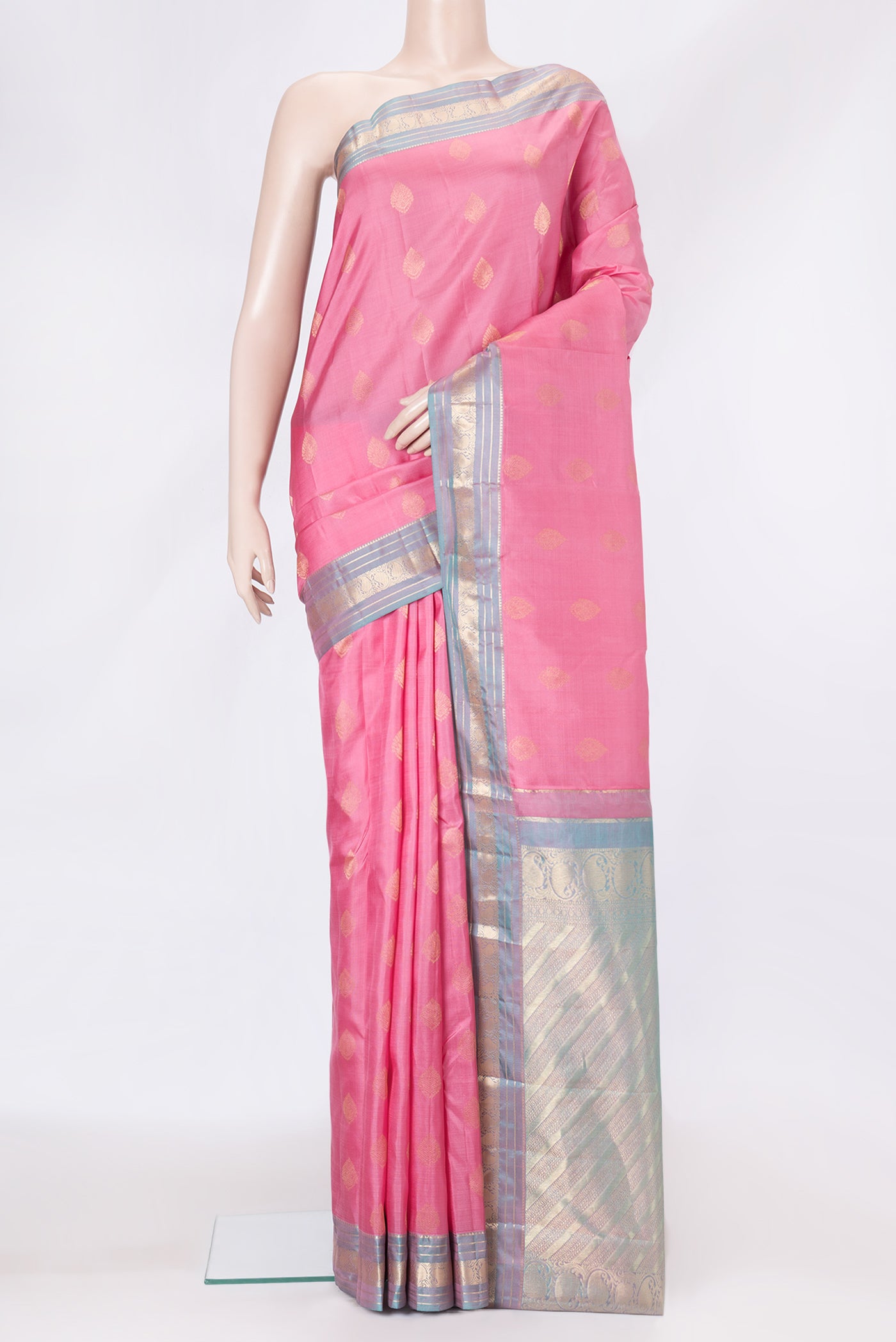 Pink Dual Tone Kanchipuram Silk Saree with Zari Butta on the body and Zari Border.  displayed on a mannequin