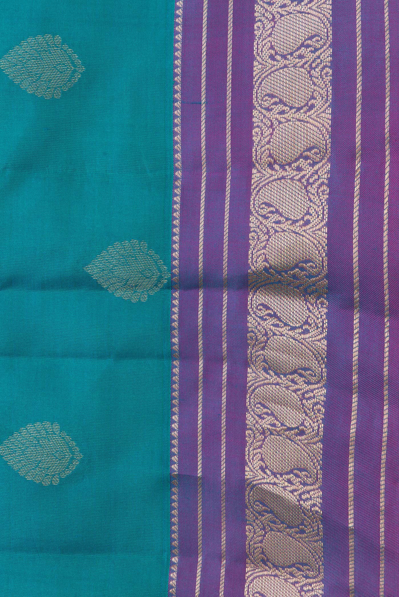 Border image of Peacock Blue Dual Tone Kanchipuram Silk Saree with Zari Butta on the body and Zari Border. 