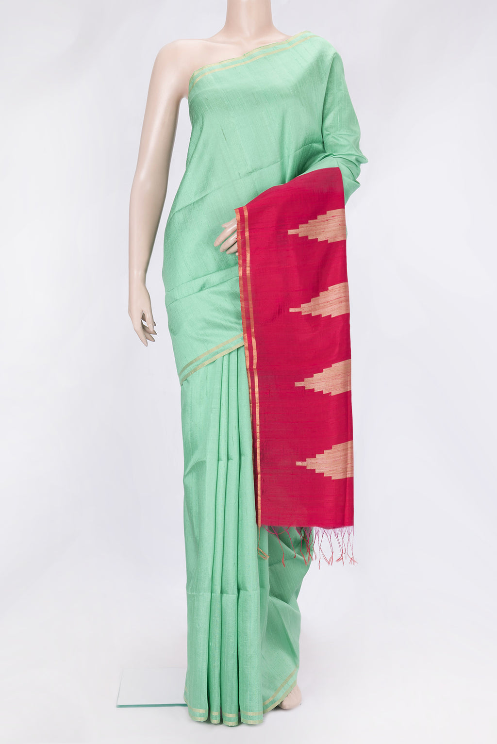 Pista Green Dual Tone Raw Silk Saree with Plain Body and Zari Border.  displayed on a mannequin
