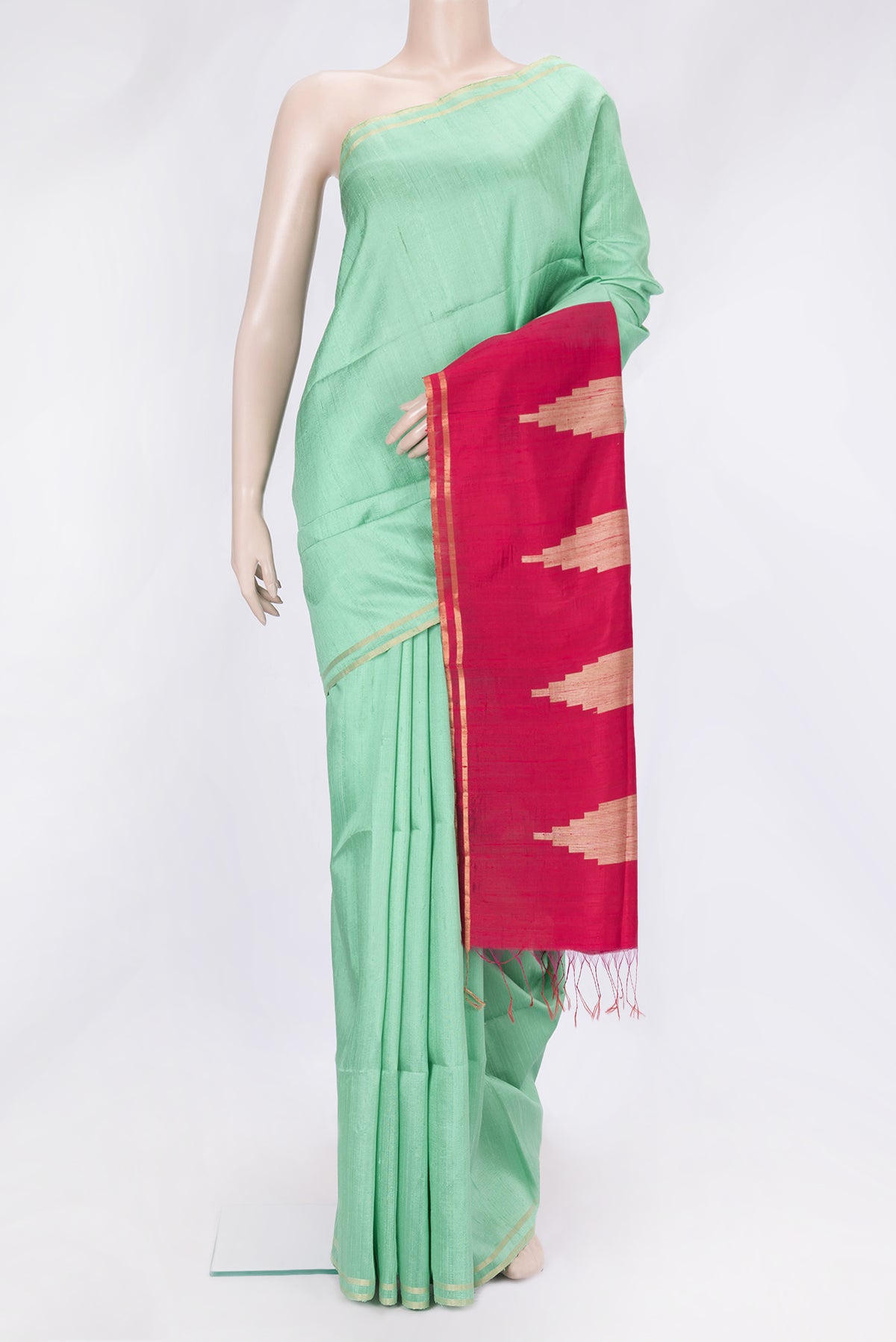 Pista Green Dual Tone Raw Silk Saree with Plain Body and Zari Border.  displayed on a mannequin