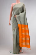 Grey Dual Tone Raw Silk Saree with Printed design on the body and Zari Border.  displayed on a mannequin