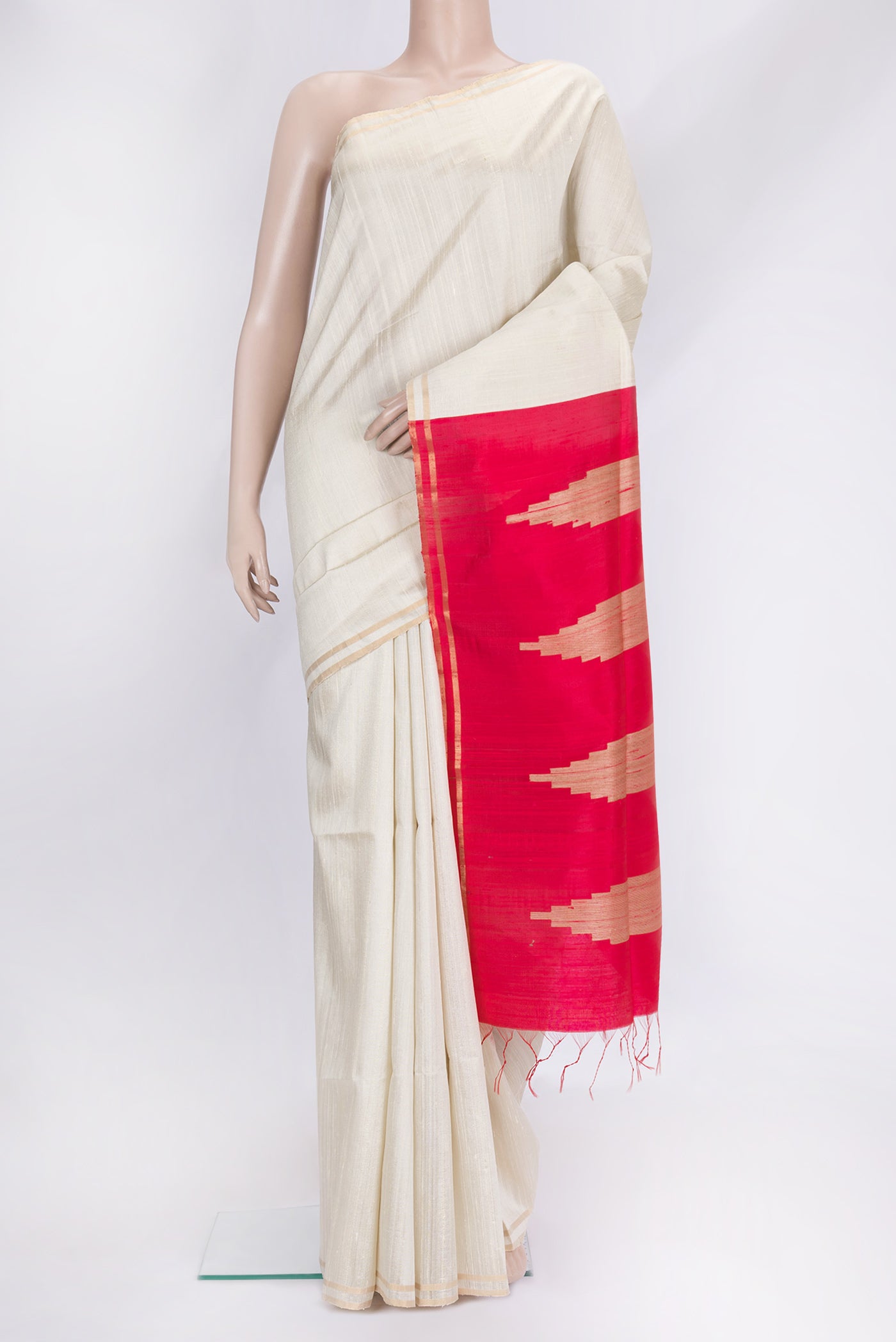 Beige Dual Tone Raw Silk Saree with Plain Body and Thin Zari Line.  displayed on a mannequin