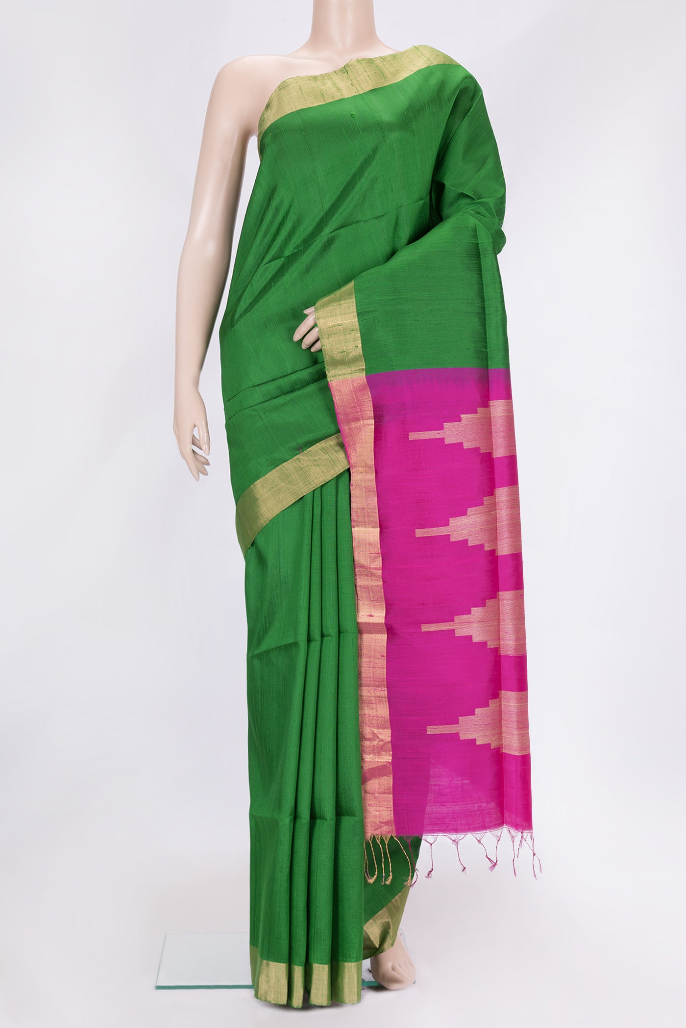 Bottle Green Dual Tone Raw Silk Saree with Plain Body and Zari Border.  displayed on a mannequin