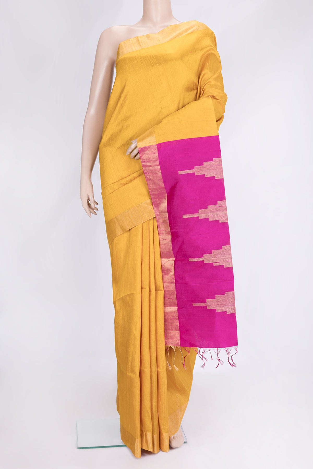 Mustard Dual Tone Raw Silk Saree with Plain Body and Fancy Border.  displayed on a mannequin