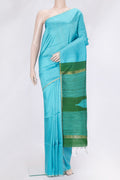 Sky Blue Dual Tone Raw Silk Saree with Checked design on the body and Zari Border.  displayed on a mannequin