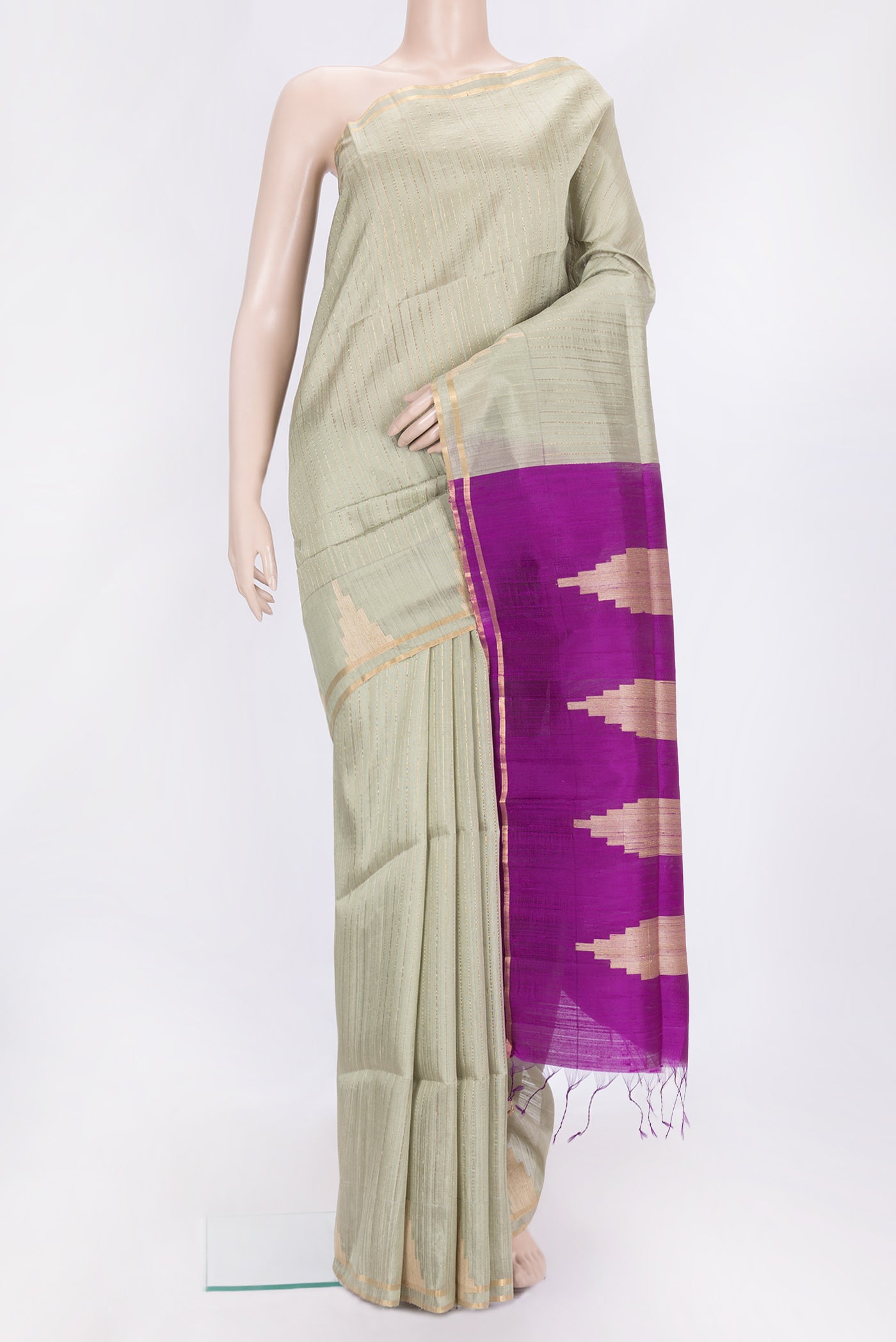 Grey Dual Tone Raw Silk Saree with Stripes on the body and Temple Border.  displayed on a mannequin