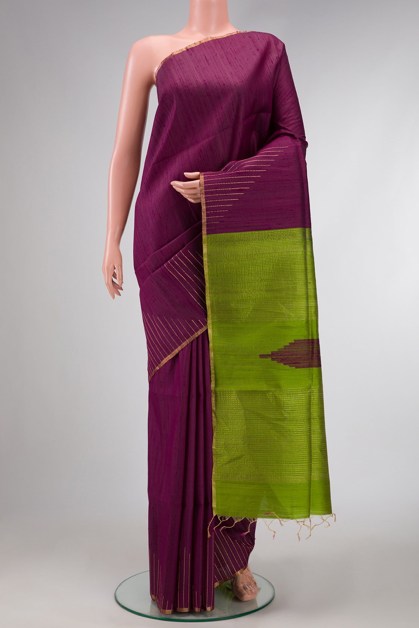 Burgundy Dual Tone Raw Silk Saree with Stripes on the body and Thin Zari Line.  displayed on a mannequin