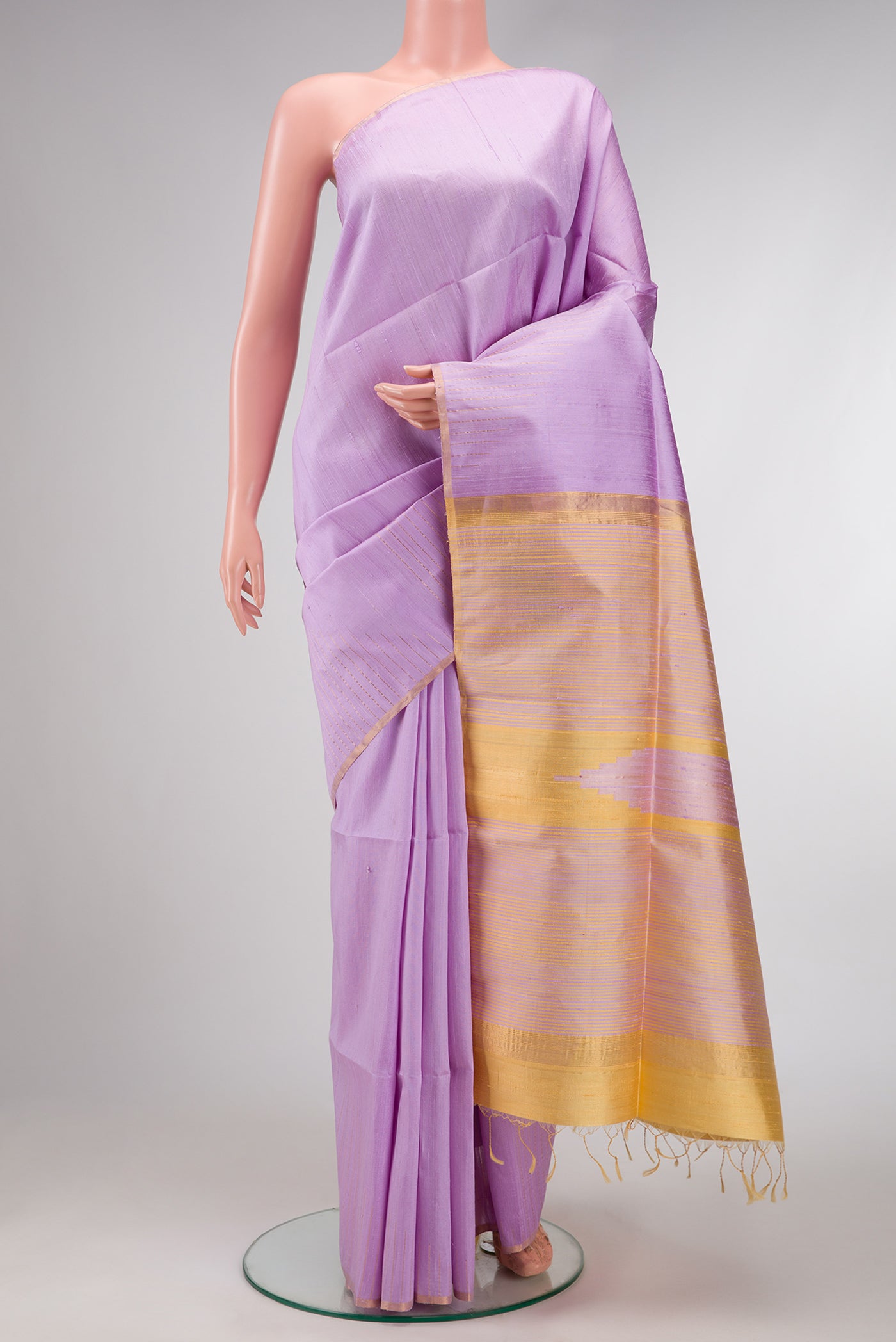 Lavender Dual Tone Raw Silk Saree with Zari Butta on the body and Zari Border.  displayed on a mannequin
