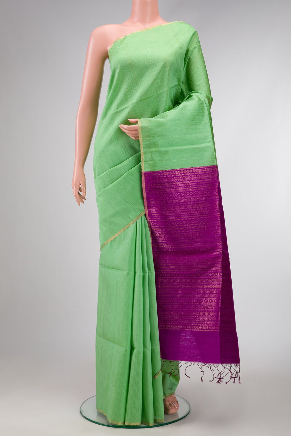 Sea Green Dual Tone Raw Silk Saree with Zari Butta on the body and Zari Border.  displayed on a mannequin