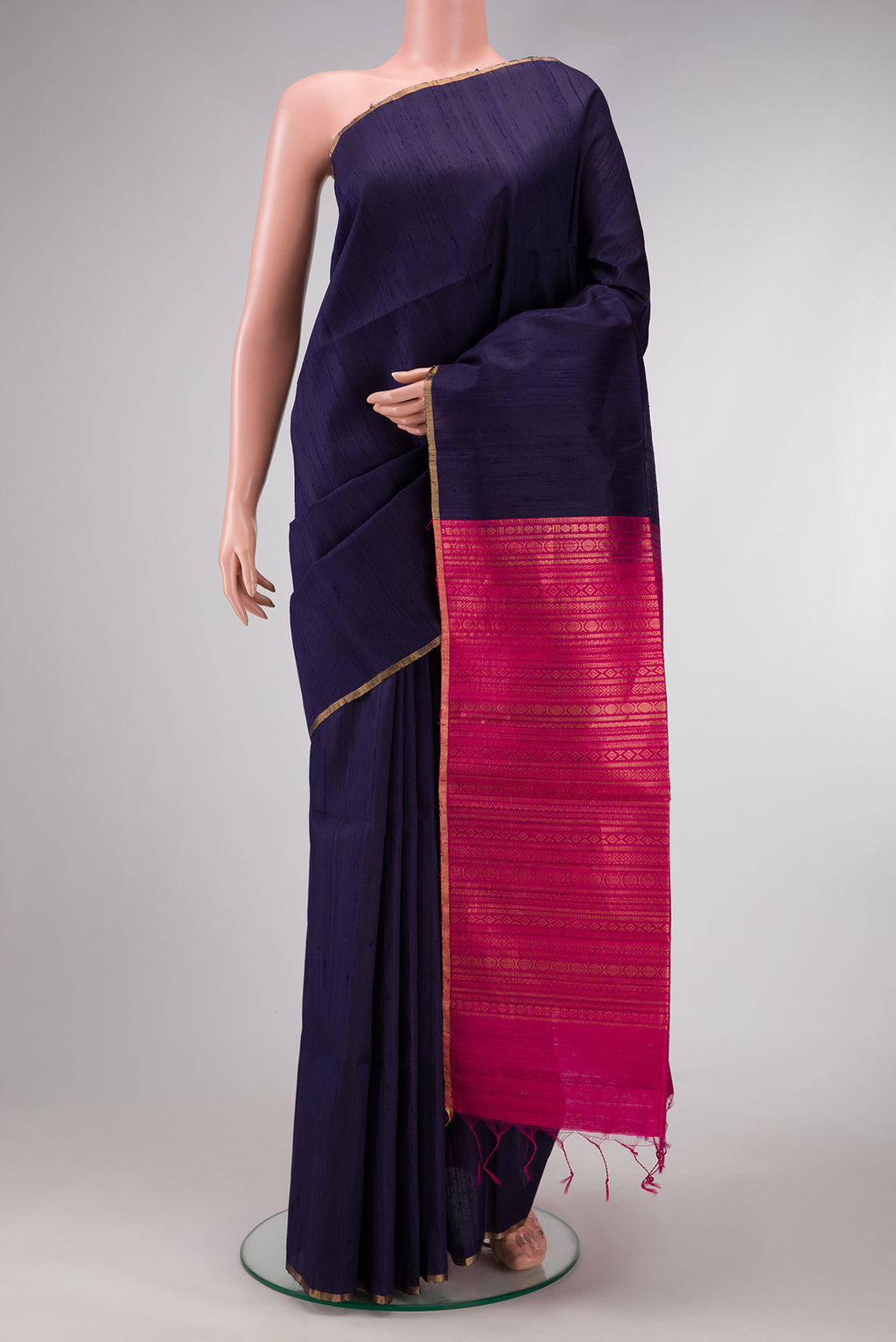 Navy Blue Dual Tone Raw Silk Saree with Plain Body and Thin Zari Line.  displayed on a mannequin