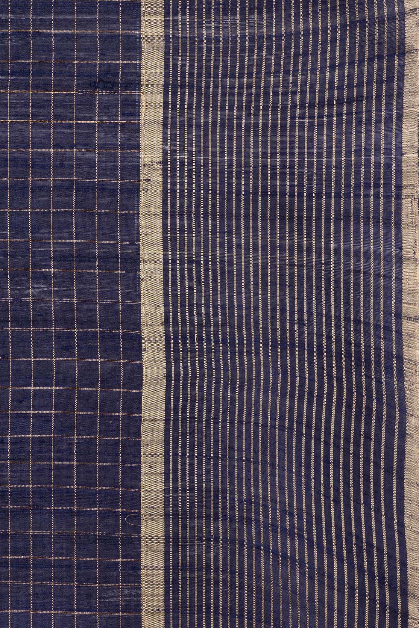 Border image of Navy Blue Dual Tone Raw Silk Saree with Checked design on the body and Zari Border. 