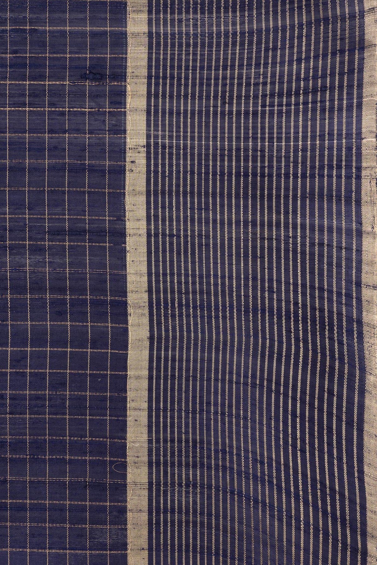 Border image of Navy Blue Dual Tone Raw Silk Saree with Checked design on the body and Zari Border. 