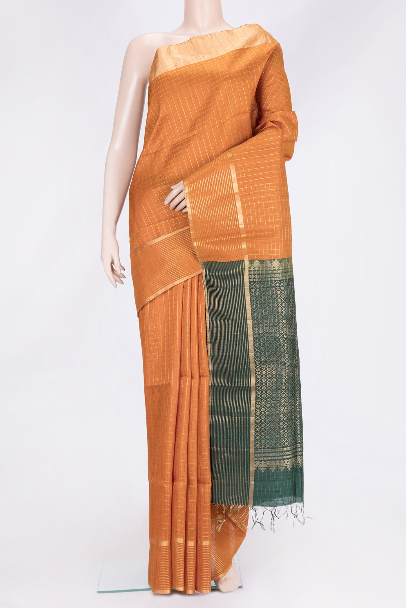 Mustard Dual Tone Raw Silk Saree with Checked design on the body and Zari Border.  displayed on a mannequin