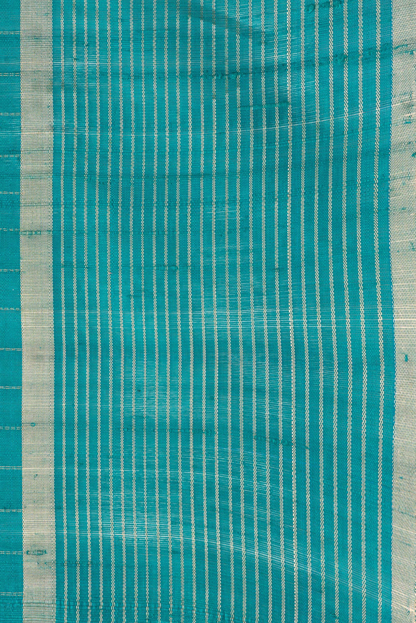 Border image of Peacock Blue Dual Tone Raw Silk Saree with Checked design on the body and Zari Border. 