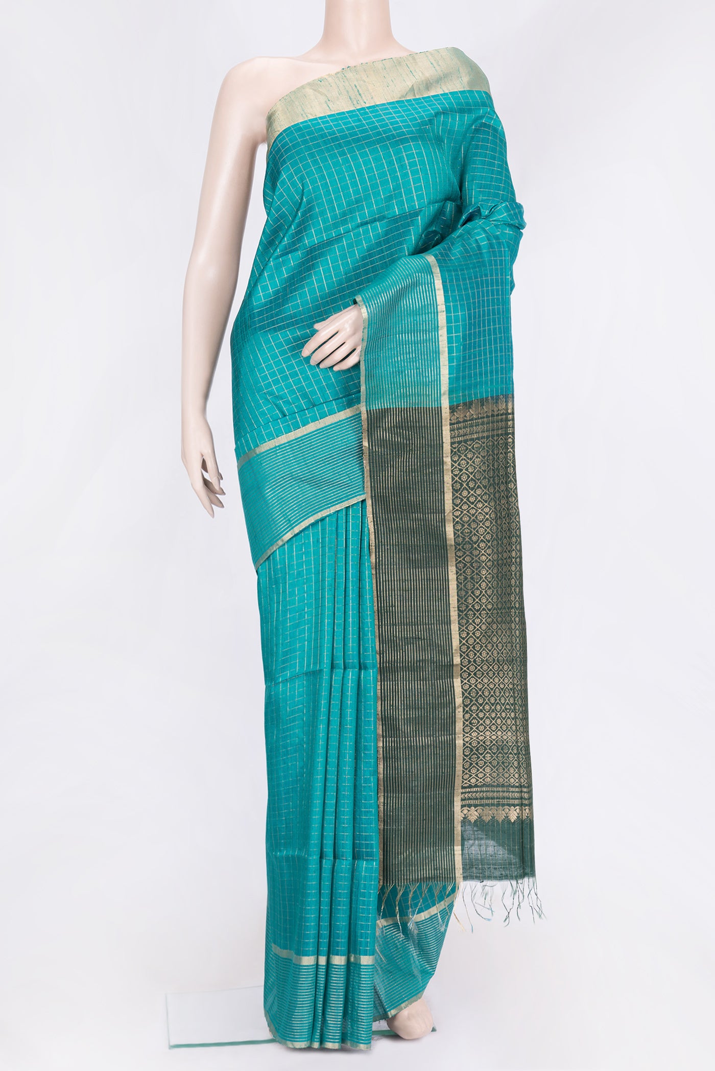 Peacock Blue Dual Tone Raw Silk Saree with Checked design on the body and Zari Border.  displayed on a mannequin