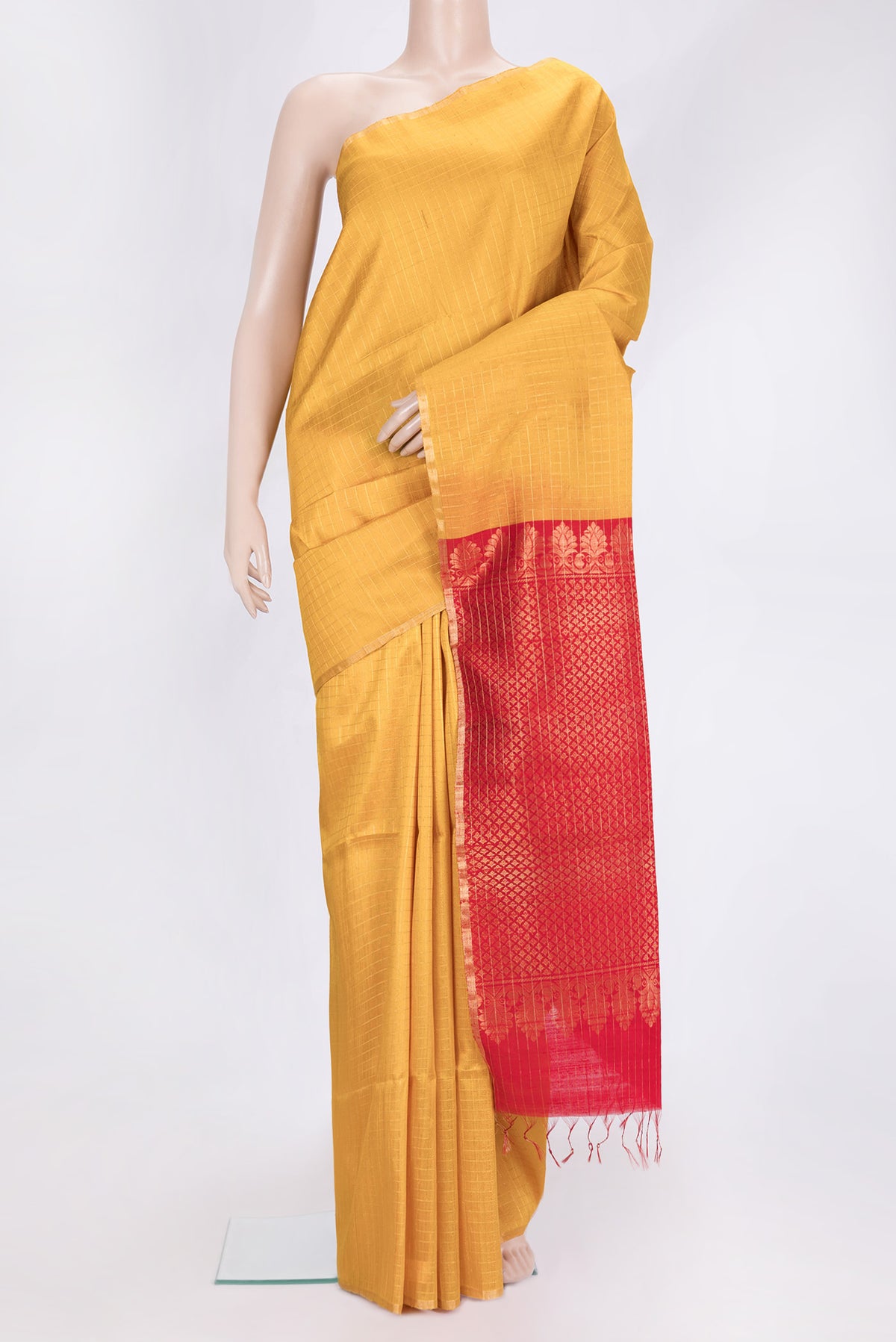Yellow Dual Tone Raw Silk Saree with Checked design on the body and Zari Border.  displayed on a mannequin