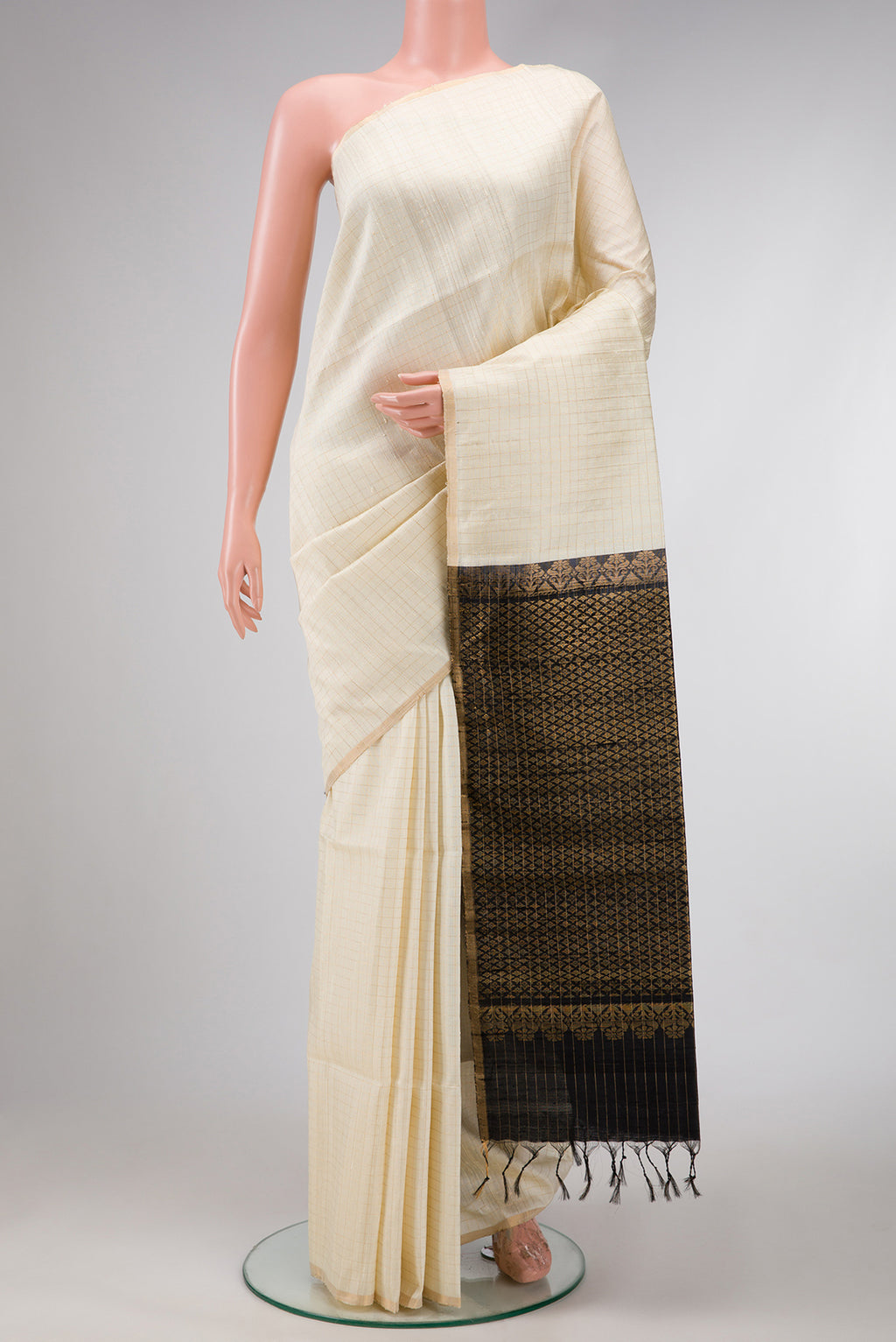 Sandal Dual Tone Raw Silk Saree with Checked design on the body and Thin Zari Line.  displayed on a mannequin
