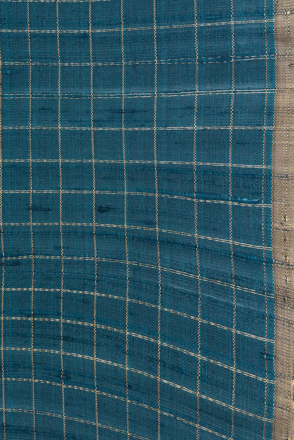 Border image of Peacock Blue Dual Tone Raw Silk Saree with Checked design on the body and Zari Border. 
