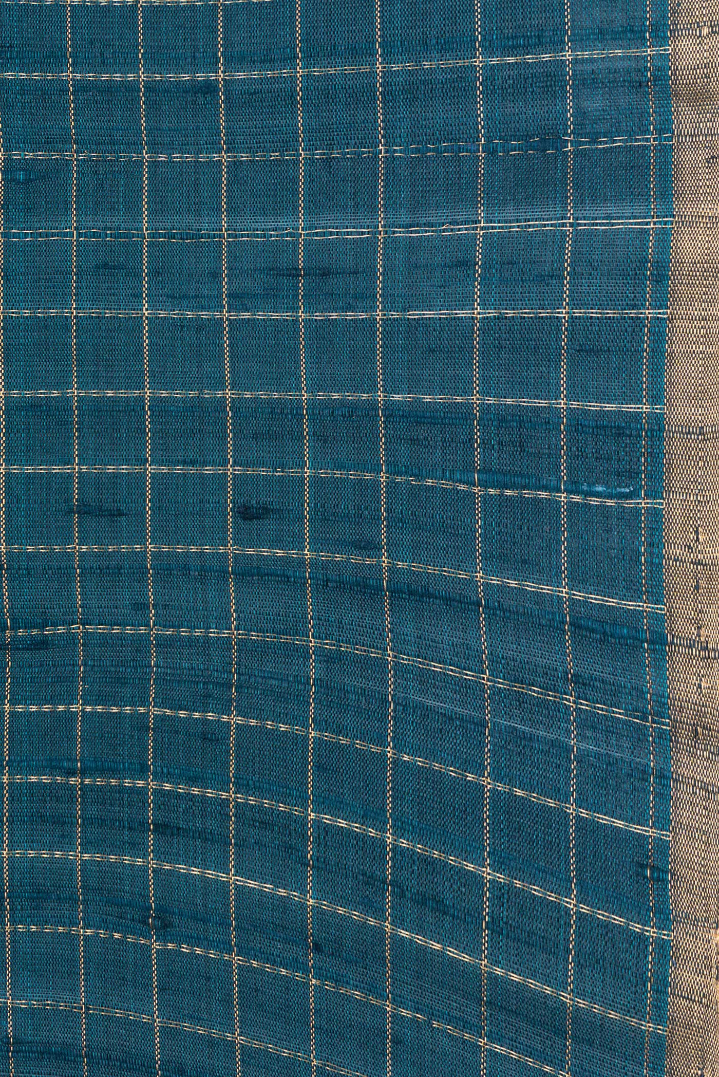 Border image of Peacock Blue Dual Tone Raw Silk Saree with Checked design on the body and Zari Border. 