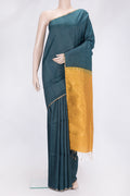 Peacock Blue Dual Tone Raw Silk Saree with Checked design on the body and Zari Border.  displayed on a mannequin