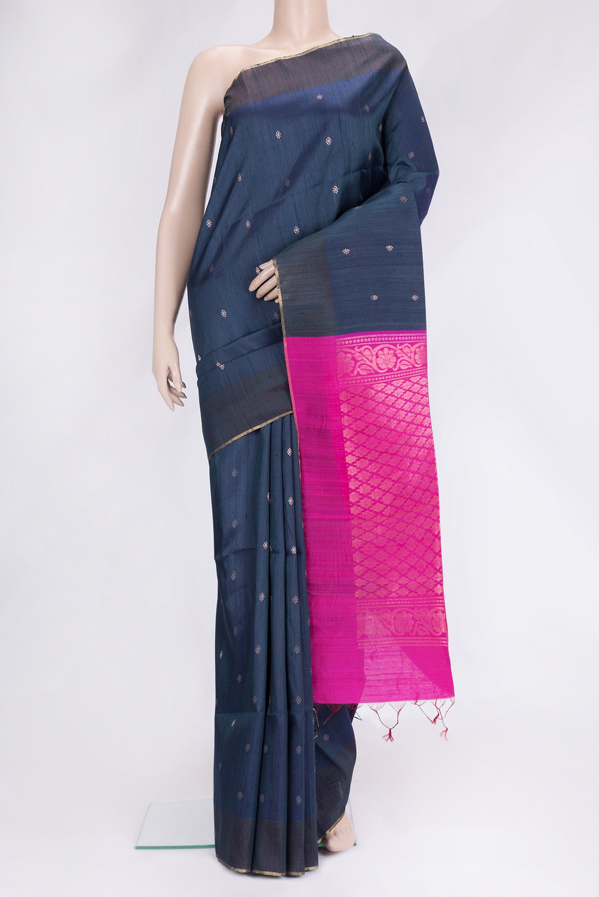 Peacock Blue Dual Tone Raw Silk Saree with Zari Butta on the body and Thin Zari Line.  displayed on a mannequin