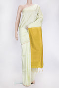Pista Green Dual Tone Raw Silk Saree with Zari Butta on the body and Zari Border.  displayed on a mannequin