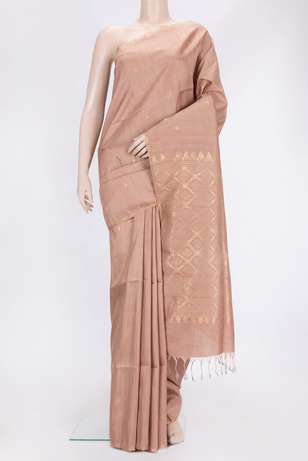 Dark Beige Dual Tone Raw Silk Saree with Zari Butta on the body and Thin Zari Line.  displayed on a mannequin