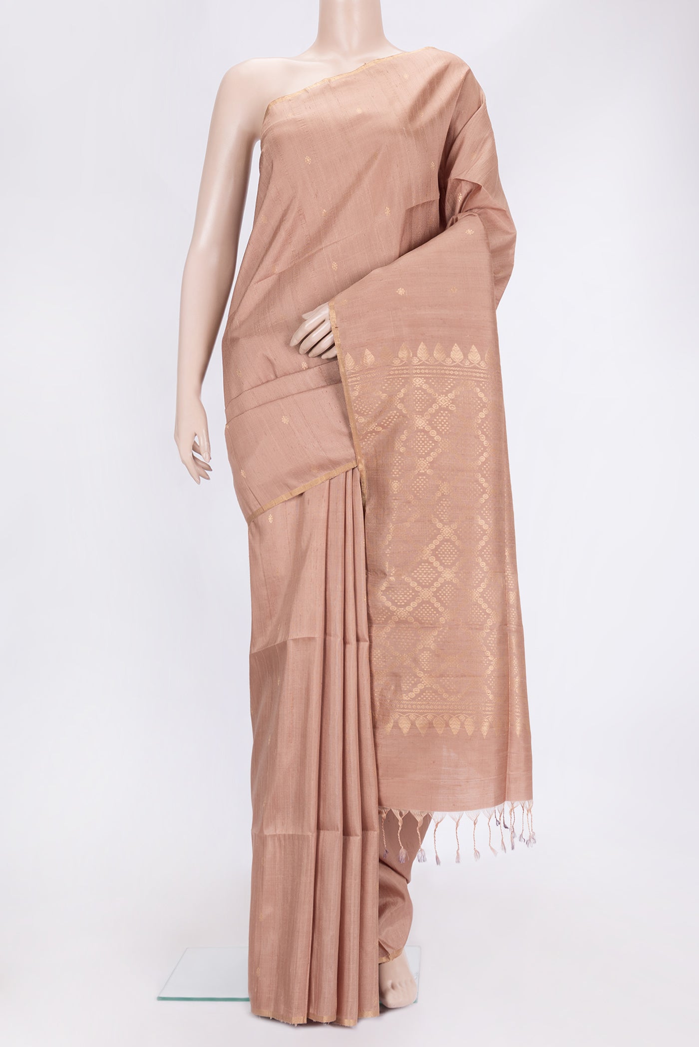 Dark Beige Dual Tone Raw Silk Saree with Zari Butta on the body and Thin Zari Line.  displayed on a mannequin