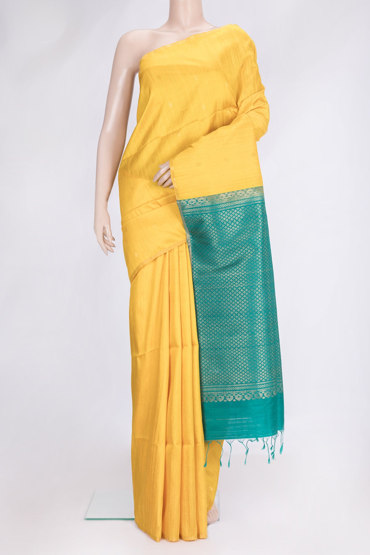 Yellow Dual Tone Raw Silk Saree with Zari Butta on the body and Thin Zari Line.  displayed on a mannequin