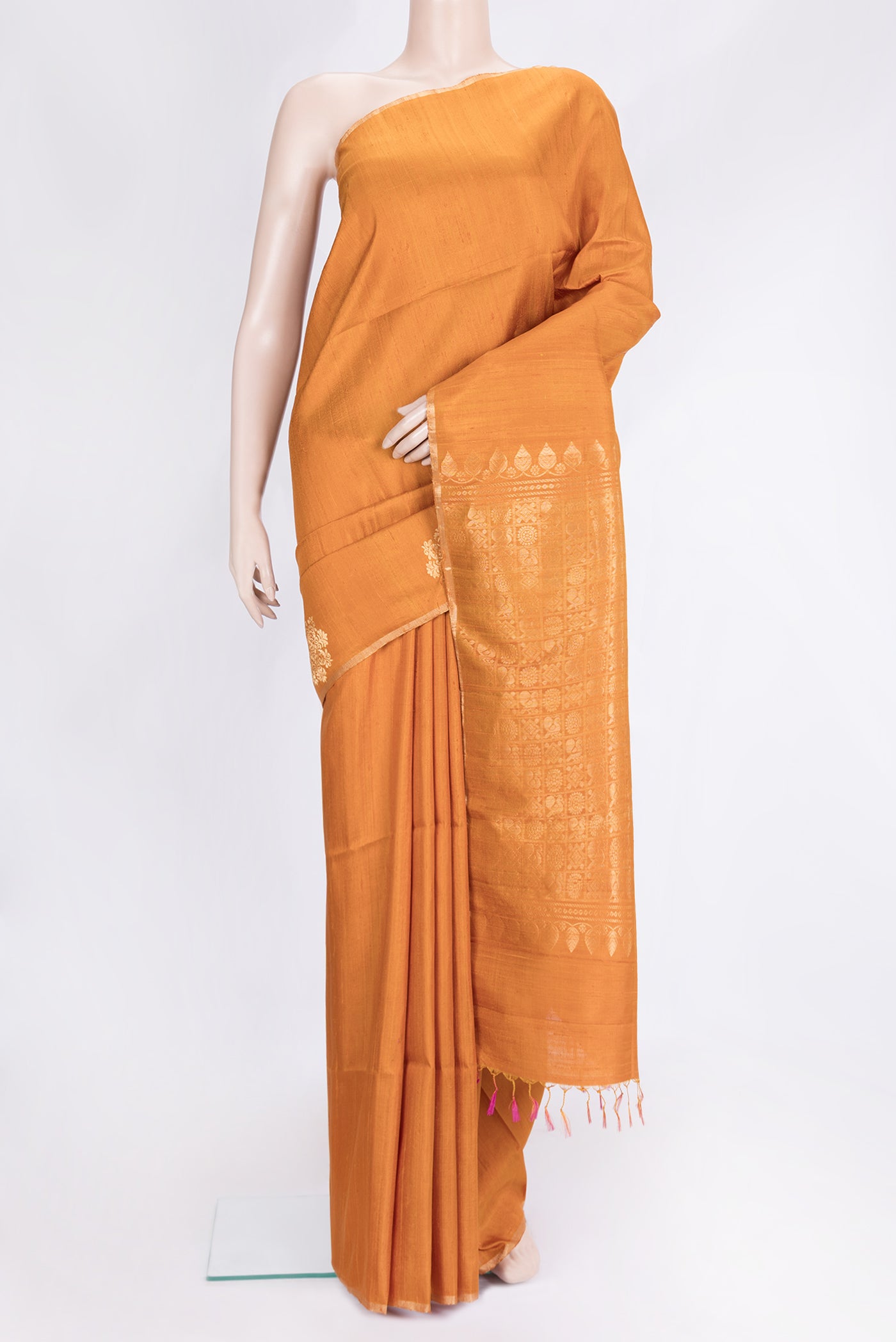 Mustard Dual Tone Raw Silk Saree with Plain Body and Fancy Border.  displayed on a mannequin