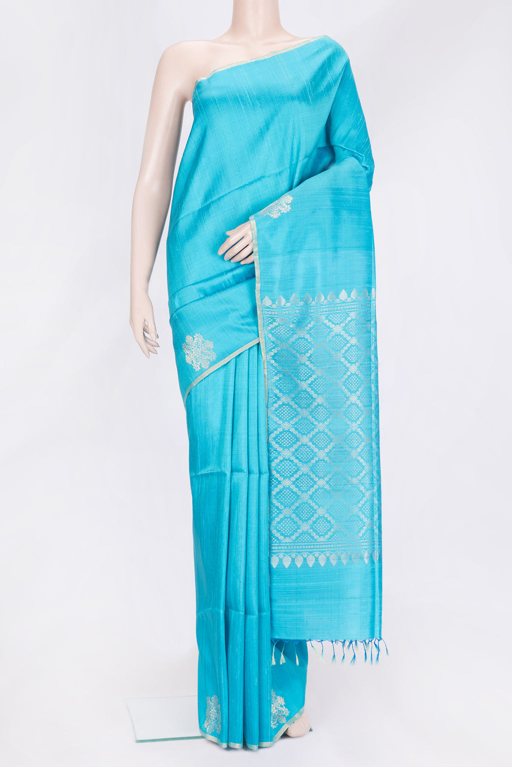 Sky Blue Dual Tone Raw Silk Saree with Plain Body and Fancy Border.  displayed on a mannequin