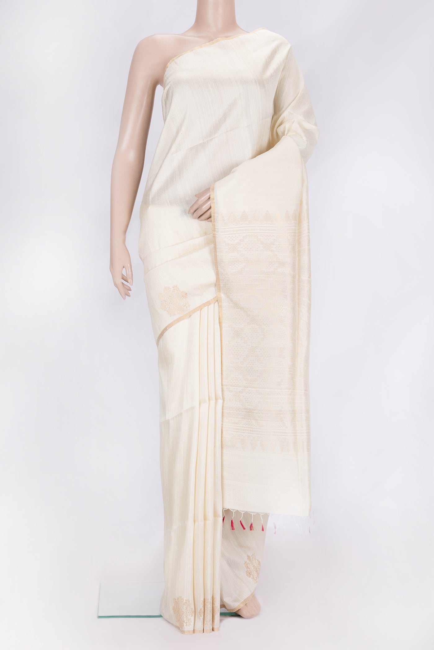 Off White Dual Tone Raw Silk Saree with Plain Body and Fancy Border.  displayed on a mannequin