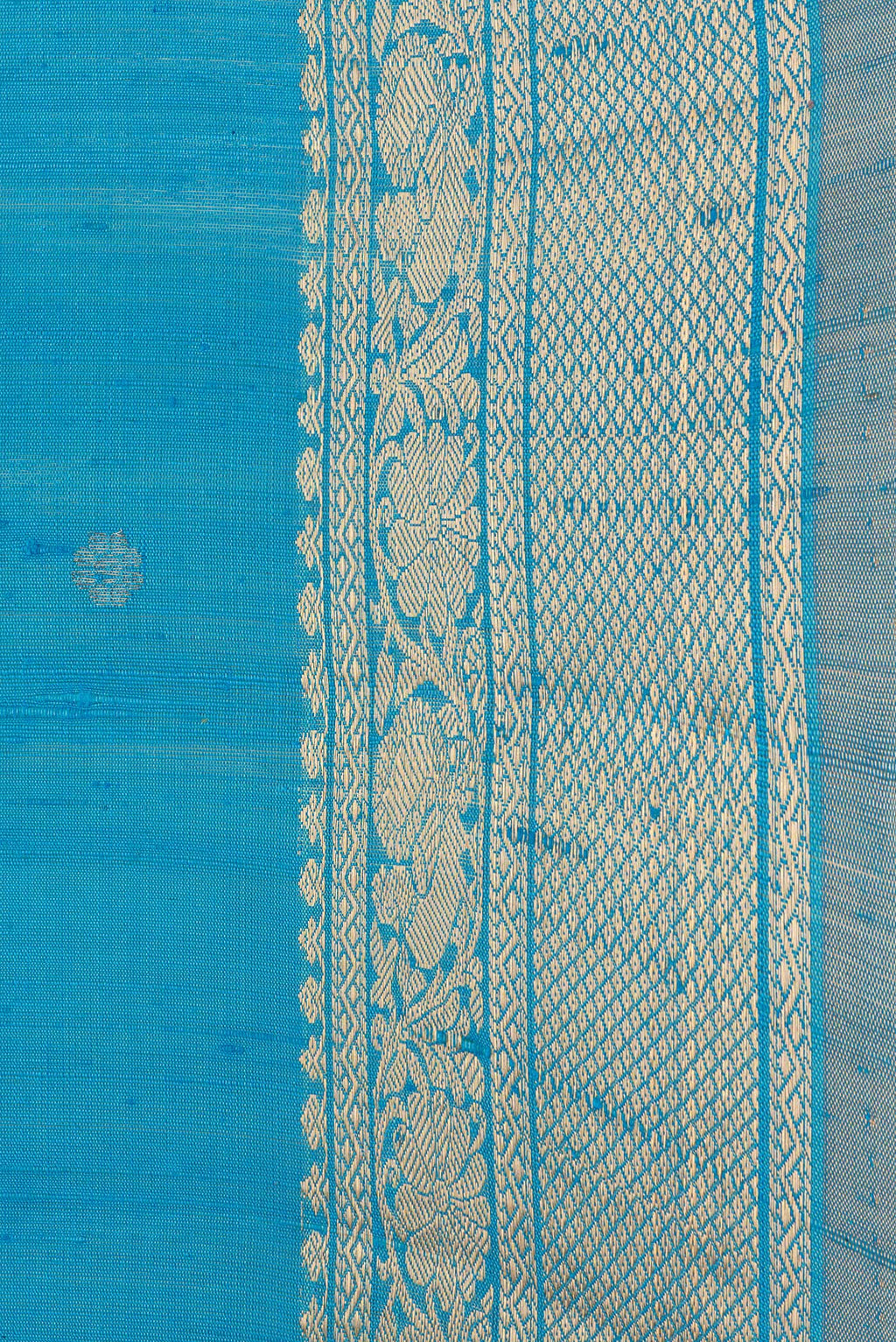 Border image of Sky Blue Dual Tone Raw Silk Saree with Zari Butta on the body and Zari Border. 